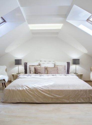 Bright attic bedroom in the apartment